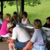 Everyone taking it easy after a enjoyable picnic and a morning of bass fishing.