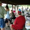 Club members and family enjoying picnic.