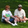 Club member Rick Ferrell and wife enjoying themselves after an afternoon meal in a cool shady spot on the hillside above the shelter.