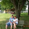 Young Love:
Jay Salser and girl friend enjoy a quiet get together from the others at a near by park bench in the shade.