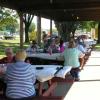 Club members relaxing after picnic tournament.