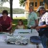 After a fine meal everyone is ready for the cakes to be cut and served.