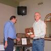 President Tom Lemley presents Chuck Vandyke with his "Top Six" plaque.