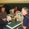 Dennis Naylor holding the conversation at his table as everyone listens.